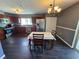 Kitchen area featuring stainless steel appliances, wooden cabinetry, and an adjacent dining space at 2022 Peaceful Palm St, Ruskin, FL 33570