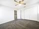 Spacious bedroom with a large closet and neutral carpeting at 4000 Barbary Ln, North Port, FL 34287