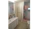 Pink bathroom with a vanity, toilet, and shower at 10315 Cortez W Rd # 26Bv, Bradenton, FL 34210