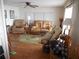 Living room with comfortable recliners and area rug at 10315 Cortez W Rd # 26Bv, Bradenton, FL 34210