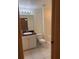 Bathroom with tub shower, vanity, and toilet at 4666 Laramie Cir, North Port, FL 34286