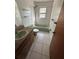 Clean bathroom with a shower/tub and wood vanity at 7027 Hawkins Rd, Sarasota, FL 34241