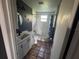 Clean bathroom featuring a tub shower combo and tile floor at 7027 Hawkins Rd, Sarasota, FL 34241