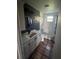 Updated bathroom with a white vanity and tile flooring at 7027 Hawkins Rd, Sarasota, FL 34241