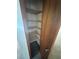 Shelved closet with wood door at 7027 Hawkins Rd, Sarasota, FL 34241
