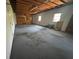 Large garage with high ceilings and concrete floor at 7027 Hawkins Rd, Sarasota, FL 34241
