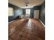 Small kitchen with terracotta tile floor and dark walls at 7027 Hawkins Rd, Sarasota, FL 34241