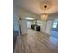 Kitchen with wood-look floors and skylight at 7027 Hawkins Rd, Sarasota, FL 34241
