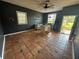 Small kitchen with terracotta tile floor and dark walls at 7027 Hawkins Rd, Sarasota, FL 34241