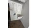 Small laundry room with utility sink and cabinets at 7027 Hawkins Rd, Sarasota, FL 34241