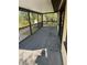 Screened porch overlooking backyard at 7027 Hawkins Rd, Sarasota, FL 34241