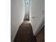 Indoor staircase with carpet and stained glass window at 7027 Hawkins Rd, Sarasota, FL 34241