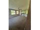 Bright sunroom with view of backyard at 7027 Hawkins Rd, Sarasota, FL 34241
