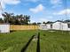 Large grassy backyard with storage shed at 8025 Roy Dr, Punta Gorda, FL 33982