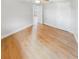Bright bedroom with wood-look flooring and ceiling fan at 9640 Mark Twain Ln, Port Richey, FL 34668