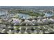 Aerial view of homes surrounding a lake at 10922 Subtle Trail Dr, Riverview, FL 33579