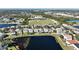 Aerial view of houses near a lake at 10922 Subtle Trail Dr, Riverview, FL 33579