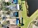 Aerial view of houses near a lake at 10922 Subtle Trail Dr, Riverview, FL 33579