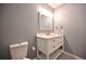 Modern bathroom with white vanity and new fixtures at 10922 Subtle Trail Dr, Riverview, FL 33579