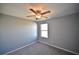 Well-lit bedroom with ceiling fan and window at 10922 Subtle Trail Dr, Riverview, FL 33579