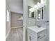 Clean bathroom with white vanity and modern fixtures at 27111 Wakefield Dr, Brooksville, FL 34602