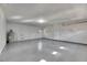 Spacious garage with light grey floor at 27111 Wakefield Dr, Brooksville, FL 34602