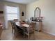 Bright dining area with table and chairs, and decorative accents at 13642 Newport Shores Dr, Hudson, FL 34669