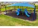 Community playground with shaded structure and slides at 3135 Great Banyan Way, Wesley Chapel, FL 33543