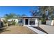 Charming house exterior with walkway and well-maintained lawn at 231 W Cornelius Cir, Sarasota, FL 34232