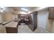 Updated kitchen featuring stainless steel appliances and a breakfast bar at 231 W Cornelius Cir, Sarasota, FL 34232