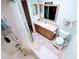 Bathroom featuring a tub with shower, toilet, and vanity at 802 Gateway Ln, Tampa, FL 33613