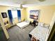 Bedroom with carpeted floor, ceiling fan, and two beds with a large window at 802 Gateway Ln, Tampa, FL 33613