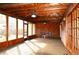 Spacious screened porch with ceiling fan at 802 Gateway Ln, Tampa, FL 33613
