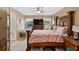 Spacious bedroom with king-sized bed and large window at 18004 Tarrington Pl, Hudson, FL 34667