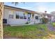 Rear exterior view, showing patio and landscaping at 18004 Tarrington Pl, Hudson, FL 34667