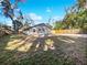 House exterior view with a large backyard and fence at 3030 46Th W Ave, Bradenton, FL 34207
