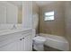 Clean bathroom with a bathtub, toilet, and vanity at 3030 46Th W Ave, Bradenton, FL 34207