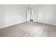 Simple bedroom with light walls and neutral carpeting at 3030 46Th W Ave, Bradenton, FL 34207