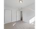 Spacious bedroom with neutral carpeting and a large closet at 3030 46Th W Ave, Bradenton, FL 34207