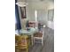 Casual dining area with round glass-top table and chairs at 3375 Osprey Ln, Port Charlotte, FL 33953