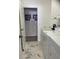 Bright laundry room with washer, dryer and storage at 3375 Osprey Ln, Port Charlotte, FL 33953