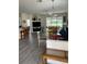 Open living space with a fireplace and view to backyard at 3375 Osprey Ln, Port Charlotte, FL 33953