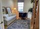 Bright office with built-in shelving and comfortable seating at 3375 Osprey Ln, Port Charlotte, FL 33953