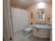 Clean bathroom with granite countertop and white vanity at 7580 Camminare Dr, Sarasota, FL 34238