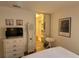 Large walk-in closet with ample shelving and hanging space at 7580 Camminare Dr, Sarasota, FL 34238