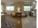 Comfortable living room with hardwood floors and seating area at 7580 Camminare Dr, Sarasota, FL 34238