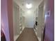 Large walk-in closet with double hanging rods and shelving at 7580 Camminare Dr, Sarasota, FL 34238