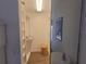 Bright walk-in closet with shelves and hanging space at 7580 Camminare Dr, Sarasota, FL 34238