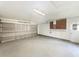 Spacious garage with an overhead door and plenty of room for storage at 14315 Knoll Ridge Dr, Tampa, FL 33625