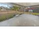 Enclosed lanai for outdoor seating and enjoyment of the backyard at 14315 Knoll Ridge Dr, Tampa, FL 33625